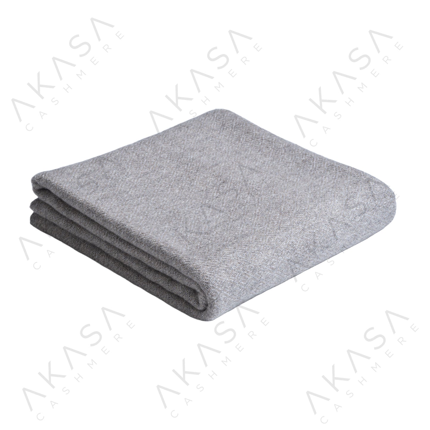 Custom cashmere blanket inspired by Himalayan heritage, crafted with traditional craftsmanship and modern luxury