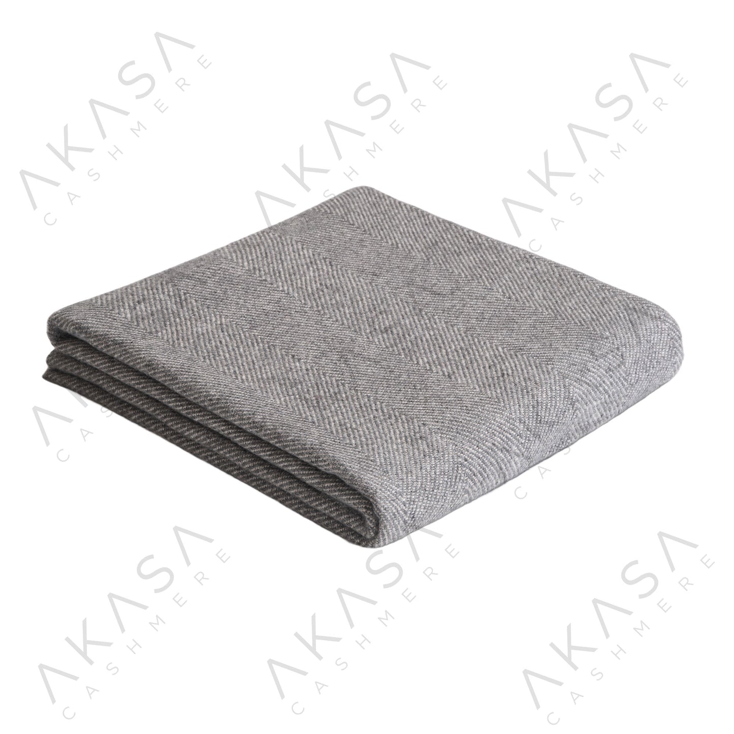 Custom cashmere blanket inspired by Himalayan heritage, crafted with traditional craftsmanship and modern luxury