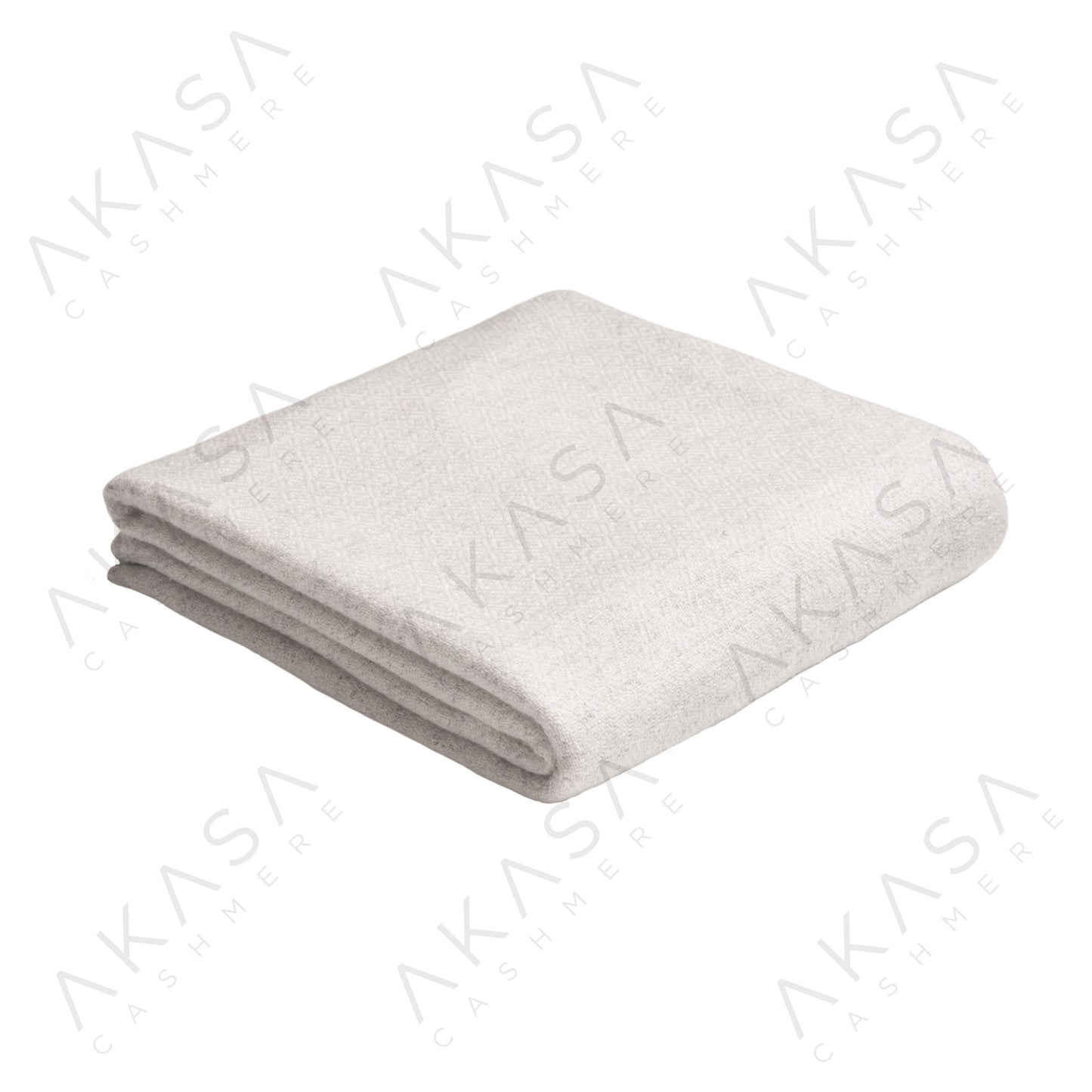 Custom cashmere blanket inspired by Himalayan heritage, crafted with traditional craftsmanship and modern luxury