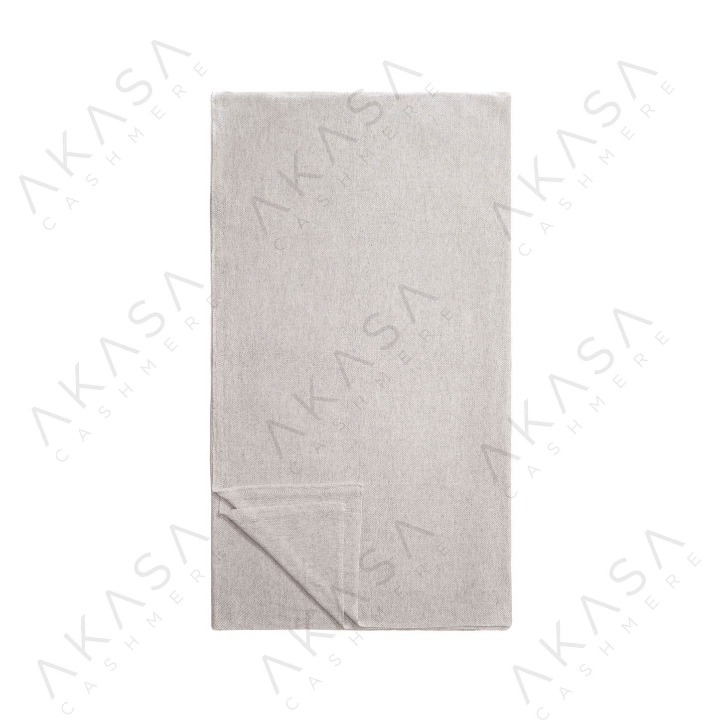 Custom cashmere blanket inspired by Himalayan heritage, crafted with traditional craftsmanship and modern luxury