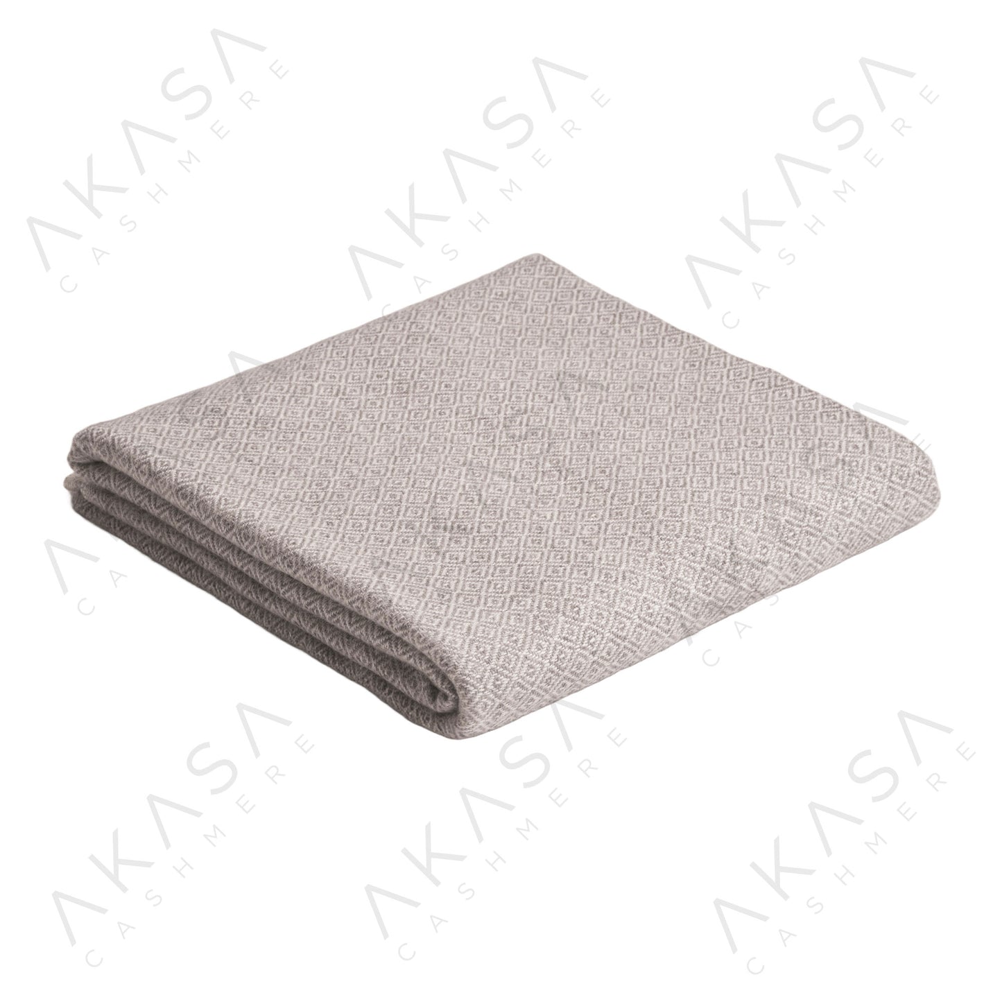 Custom cashmere blanket inspired by Himalayan heritage, crafted with traditional craftsmanship and modern luxury