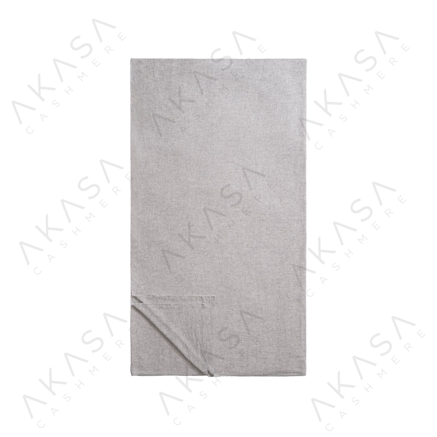 Custom cashmere blanket inspired by Himalayan heritage, crafted with traditional craftsmanship and modern luxury