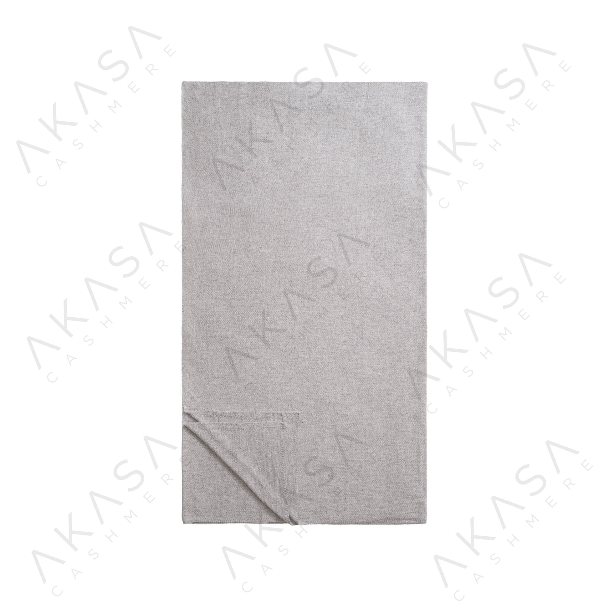 Custom cashmere blanket inspired by Himalayan heritage, crafted with traditional craftsmanship and modern luxury