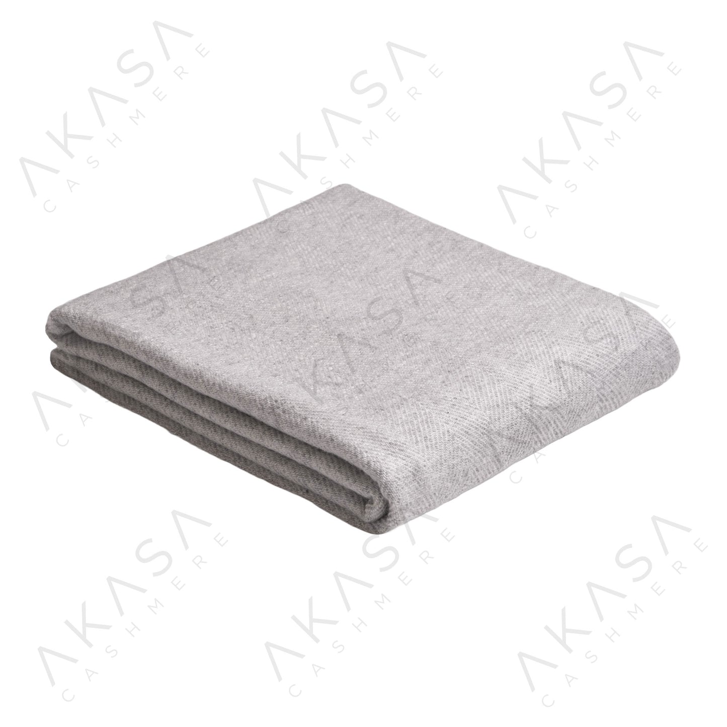 Custom cashmere blanket inspired by Himalayan heritage, crafted with traditional craftsmanship and modern luxury